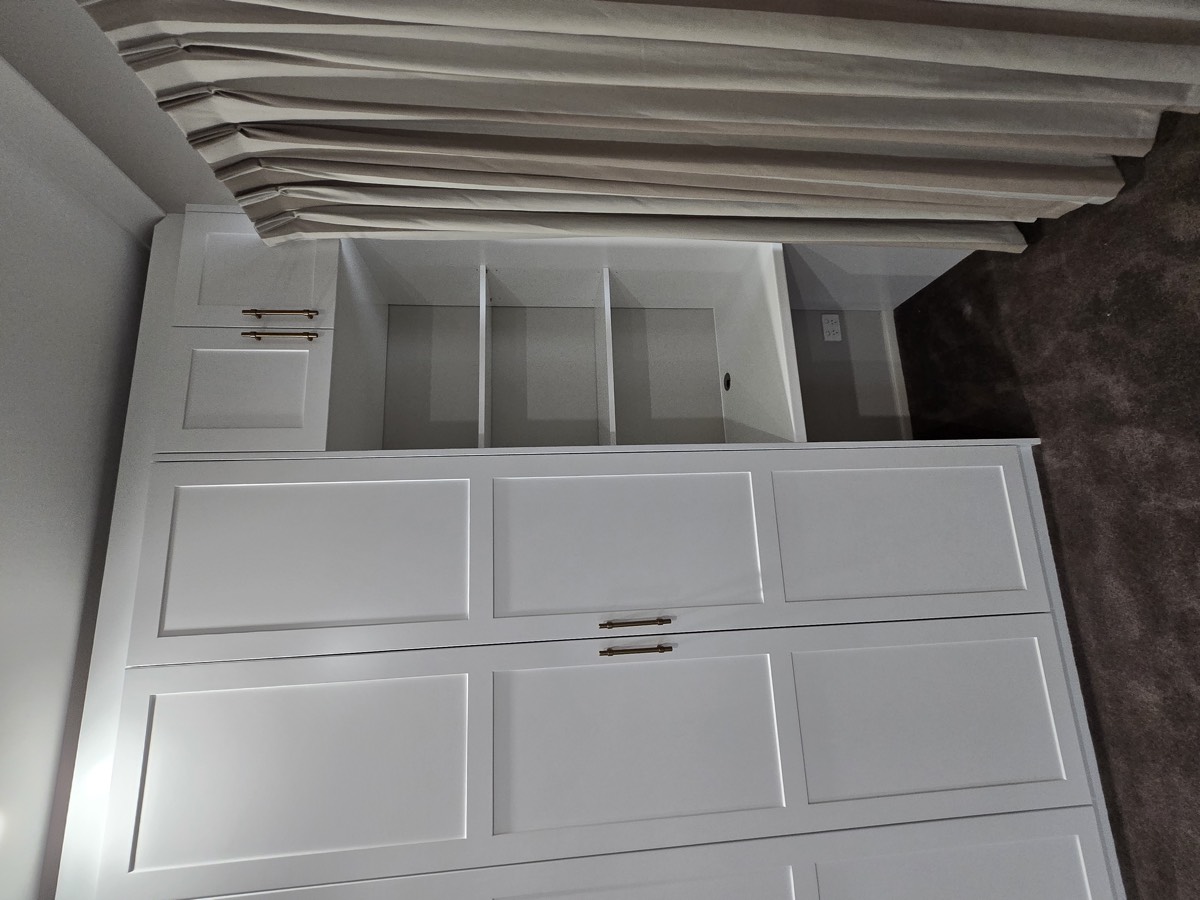 White built-in wardrobe interior shelving