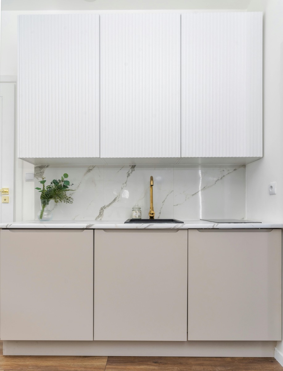 Classic white kitchen with subway tile splashback
